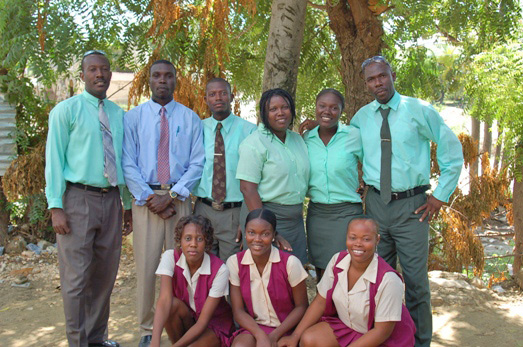 Ralph (in blue shirt) with the rest of the school staff in October 2008.
